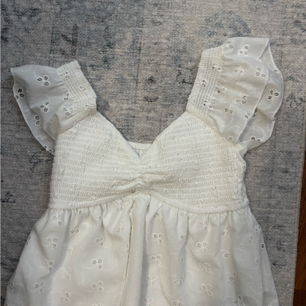 White Eyelet Ruffle Sleeve Top